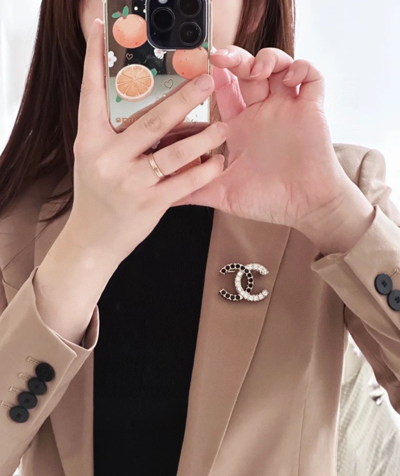 Ch**el brooches